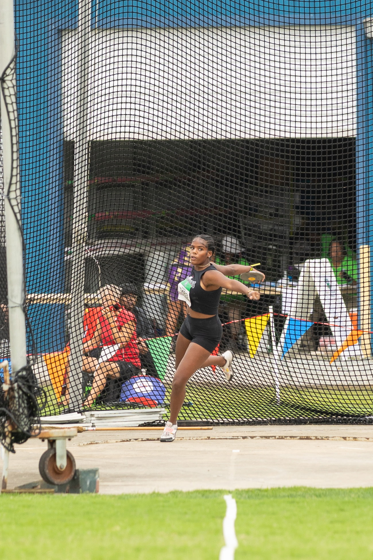 Violet Smith throwing a discus